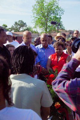 Saying some solemn words and a prayer for the people who had died in the area