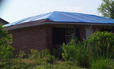 FEMA Still paying thousands to have blue tarps put on