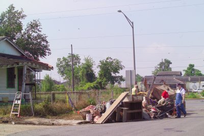 Volunteers Cleaning Debri from a Home in May 2007