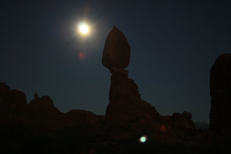 The moon behind the Balance Rock