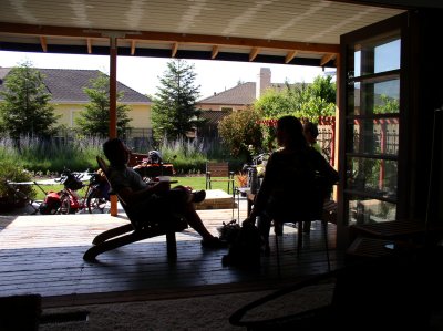 Sliding trifold doors open living to the outdoors.