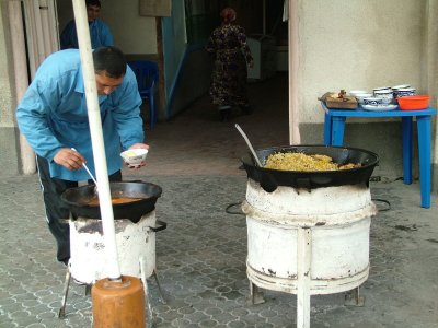 Serving Plov Tashkent Uzbekistan.JPG
