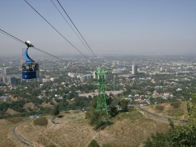 Looking down to Almaty from Kok-Tube hill. Tall building right of centre is Hotel Kazakhstan