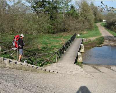Crossing the wooden bridge past Burguete