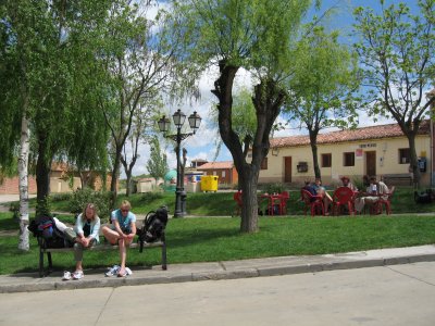 Pilgrims tending to their feet, a typical sight at any stop along the Way