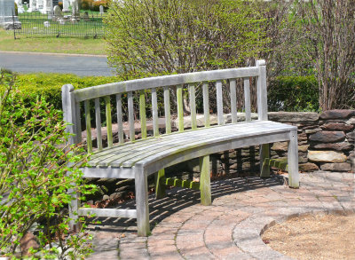 solemn bench in cemetery