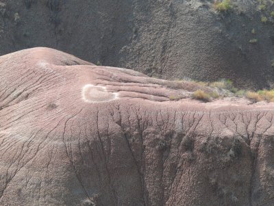 heart-shaped imprint on top of the mountain