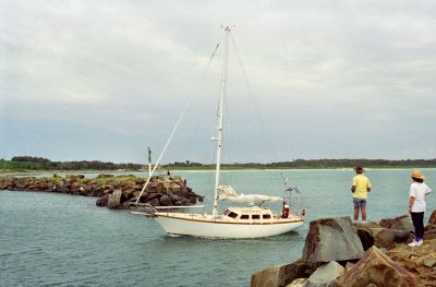 Yacht entering Crowdy Head harbour