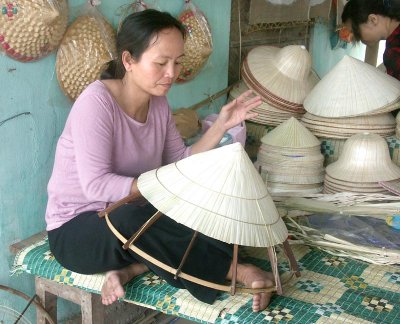 Maker of conical hats