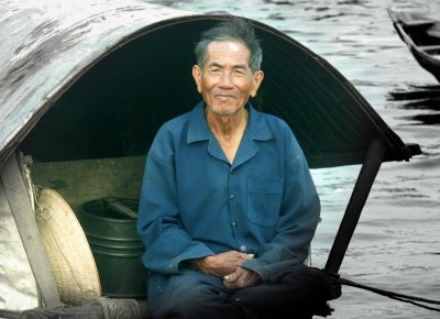 Proud to be photographed on his boat