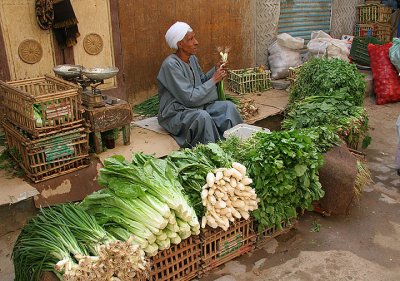 Leek seller in Aswan Market.jpg
