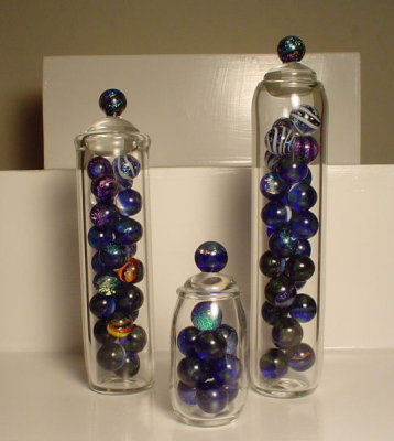 Jars that Shell created and filled with her marbles.