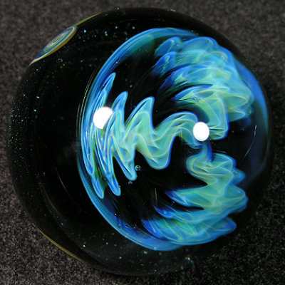 The top of the marble sports a sweet silver fumed wigwag.