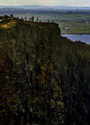 Cliffs of Moher with People on top.