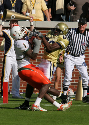 Tech WR James Johnson denies Miami SS Kenny Phillips an interception