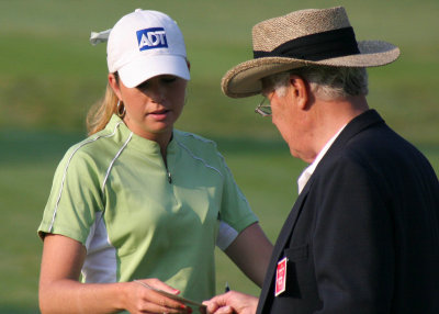 Paula Creamer with an official