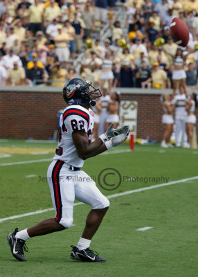 Samford  WR Jeff Moore fields the opening kickoff