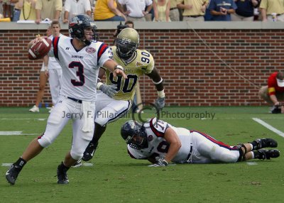 Tech DE Darrell Robertson pressures the Samford QB