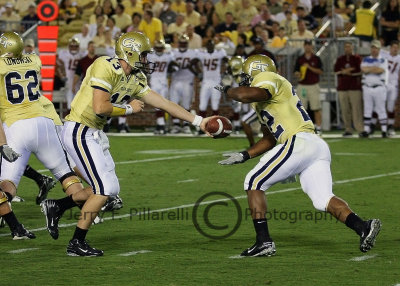 Tech QB Taylor Bennett hands off to RB Tashard Choice