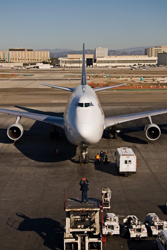 Marshaller Signalling To The Captain To Stop.