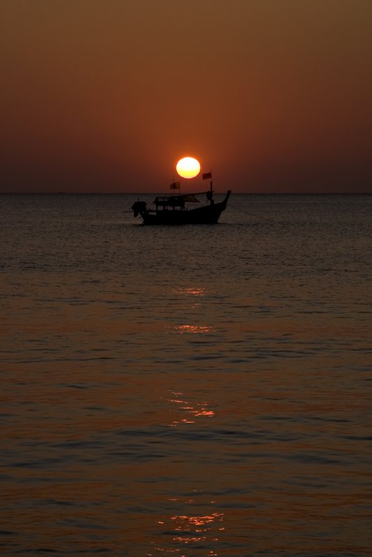 Boat In Sunset