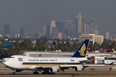 Singapore Airlines Cargo With Los Angeles Skyline In The Background