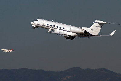 Two Business Jet's In Climbout