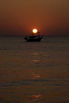 Boat In Sunset