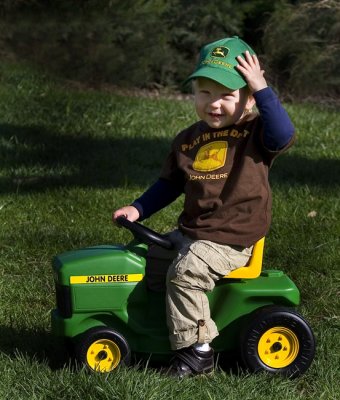 Dmitri driving the John Deere