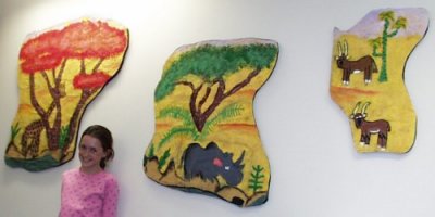 Em w/ Her Elephant's Child Pieces
