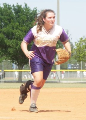 Katy Charges a Bunt