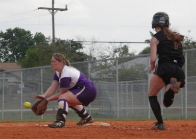 Meg C Snags the throw for the out