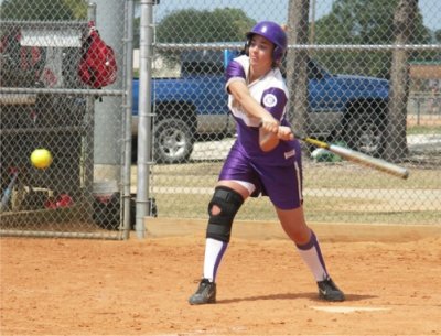 Meg O Pokes an RBI single on a changeup