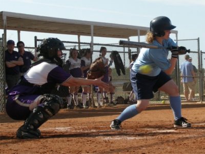 Heather Finishes Behind the Plate