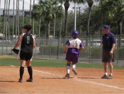 Meggan legs out a single