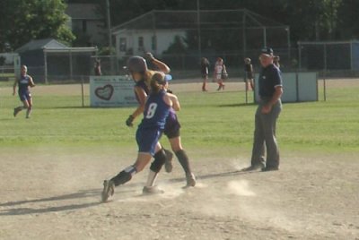 Katelyn Tags Runner in Double Play