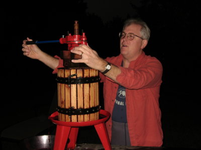 Don helping Emiko press grapes at home in Saratoga.