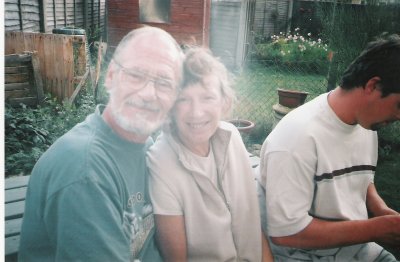 Dad Mum and Me Adrian in my back yard.