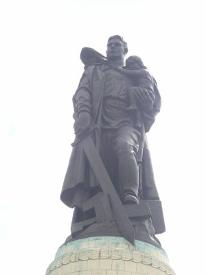 Russian Monument of a Soldier Holding a Child and Slaying a Swastika