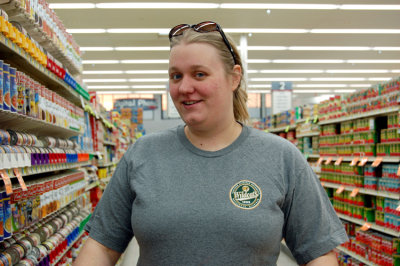 Salena began to become weary of her husband constantly snapping shot after shot of her. Here we see her in the grocery store. He couldn't help it, just look at that sexy thing. Yummy.