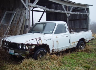 As a hobby project my grandfather restored this truck at 100,000 miles. I then put another 150,000 on it. It sat behind the barn for years. Now it's in Datsun Heaven.