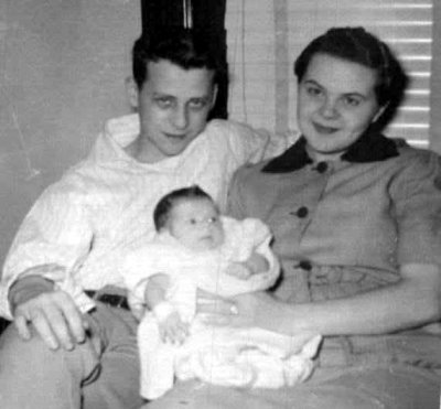 This picture was taken in Lincoln in 1957. It shows Richard Lee Mann, his wife Donna Lee Dungan Mann & their daughter, my sister, Tonetta Kay Mann.