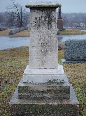 Physician, city father, early entrepreneur in Kansas City, Missouri. He had served as hospital steward in the Army of Napoleon. Arriving here in the early 1840s, Dr. Troost's first wife soon died. In 1846 Troost married the young widow, Mrs. Mary Kennerly. She was a favorite niece of the wealthy and prominent bachelor, William Gilliss. Dr. Troost was physician, city father and early entrepreneur. At the sale of lots of the Town Company of Kansas in 1846, he bought five. In 1849 as the California gold rush peaked, Troost and his wife's uncle built the town's first brick hotel. Situated near the river, the Gilliss House stood at the corner of Delaware and Wyandotte Streets. >From 1850 Dr. Troost served as a trustee of our Town. He was elected a city councilman. But on February 8, 1859, the kindly doctor died at age 72. He was buried in the old Catholic cemetery beside his first wife. Later when that burying ground was closed, both were moved to Mt. St. Mary's cemetery. There the second Mrs. Troost erected a monument, oddly inscribed. Instead of Benoist Troost, it reads Benoit Troost. The doctor's widow Mary lived another 13 years. Her late uncle, William Gilliss, had left his considerable fortune to her. She, in turn, devoted most of it to creating the Gillis Orphans' Home in his memory.