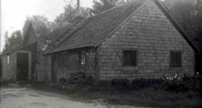 This is a picture of the Robinson House, Engadine, Mackinac, MI. This house burned down in 1962, and was replaced. Salena Marie [Robinson] Mann, is in posession of an original copy of this photograph