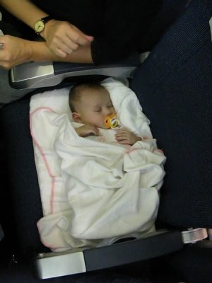 Angelica sleeping on the plane back to Denmark