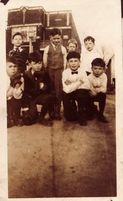 Thomas Joseph Bolton (middle, in vest) and ?