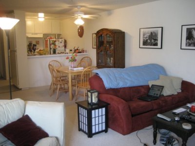 Living room area with more of Della's photos on the wall