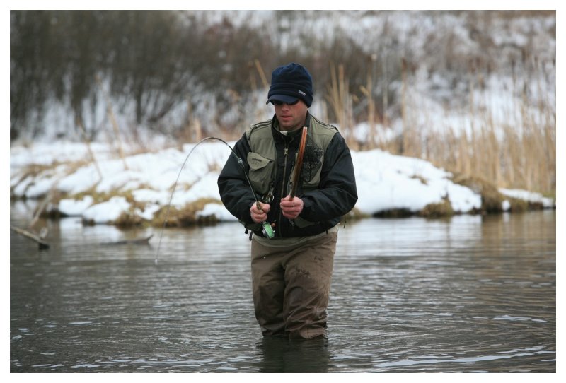 Wade plays a fish