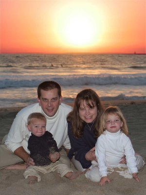FamilySitsSunset_8841.jpg