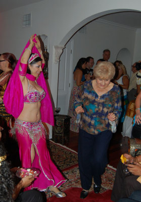 David's Mom, Ana shows the Belly Dancer some new moves